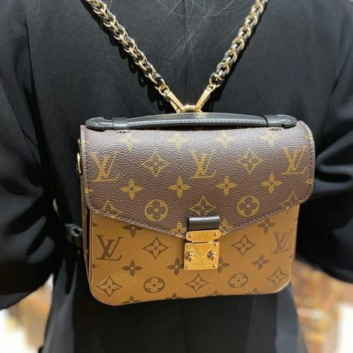 Pochette M é tis handbag in the double shoulder mailman bag series