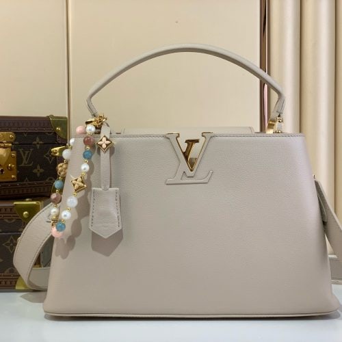 CAPUCINES SOUPLE Medium Handbag